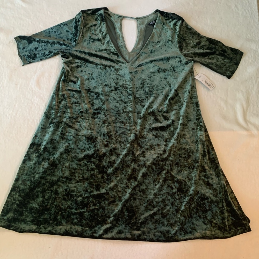 Unusual velvety green , knee length dress
